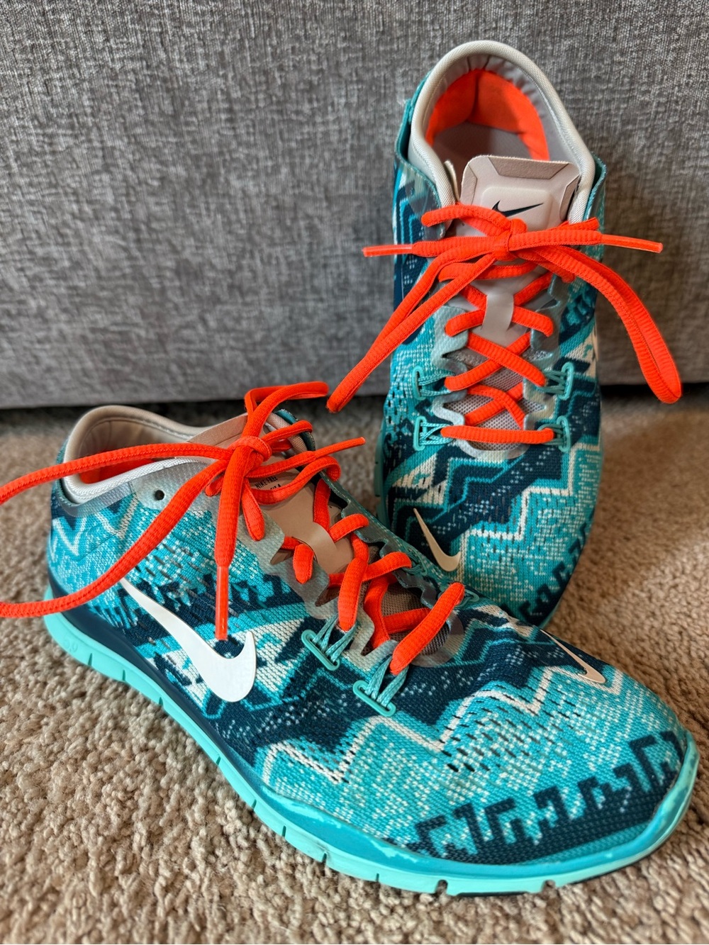Nike Turquoise Patterned Sneakers with Bright Orange Laces